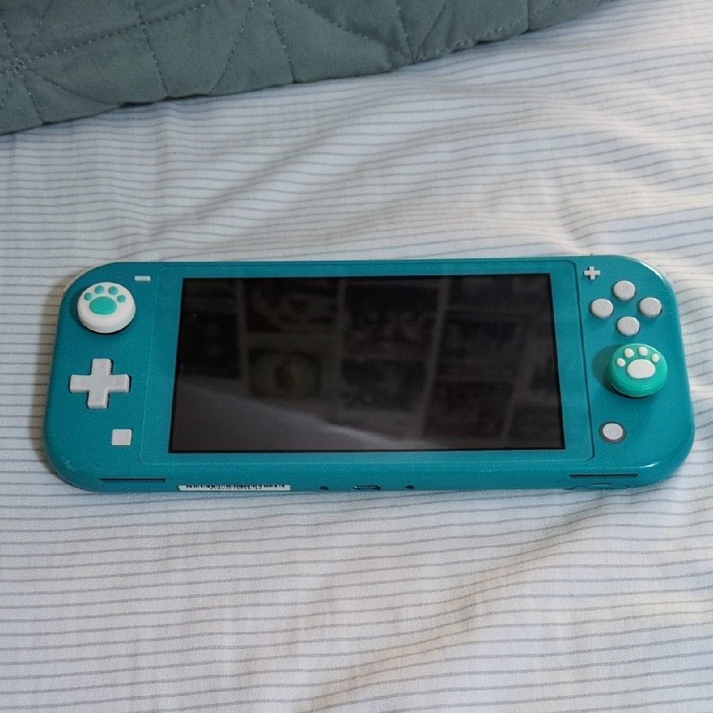 Nintendo Switch Lite in Teal with Custom Paw Buttons